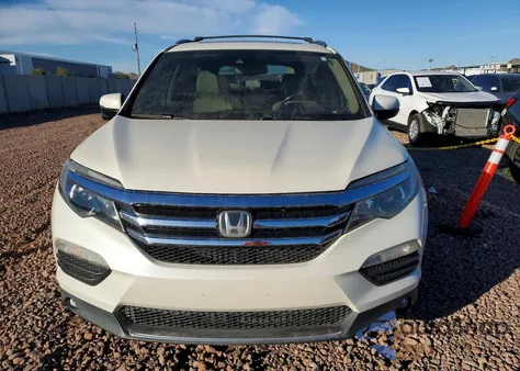 2016 Honda Pilot Touring z USA, uszkodzony, nr VIN 5FNYF5H92GB052677